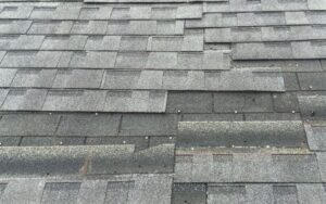 Missing shingles from wind damage. 